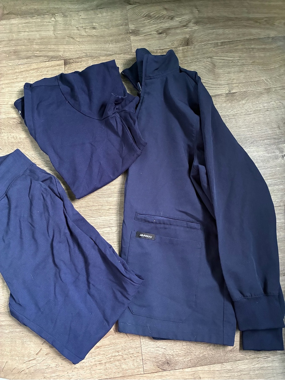 Jaanuu Navy Three-Piece Scrub Set